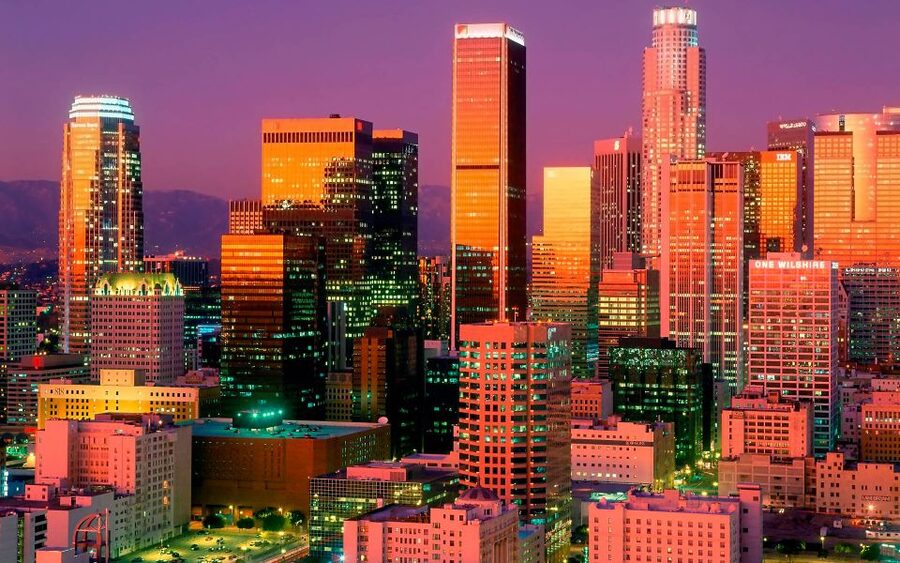 Best of Los Angeles Day Tour with German-Speaking Guide - Santa Monica Pier and the Venice Canal Historic District end your day nicely