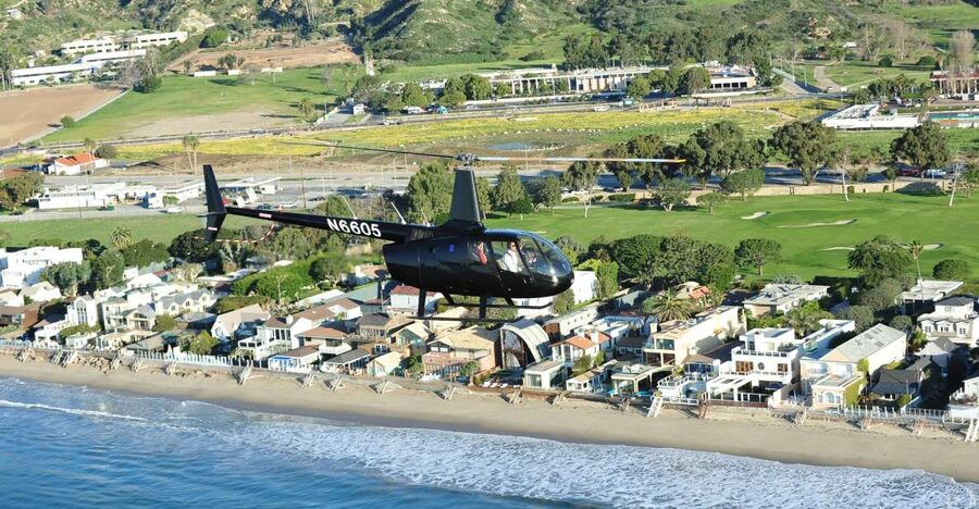 California Coastline & Hollywood Celebrity Helicopter Tour - The coast stretch: Santa Monica Pier, Venice Beach, and Pacific Palisades