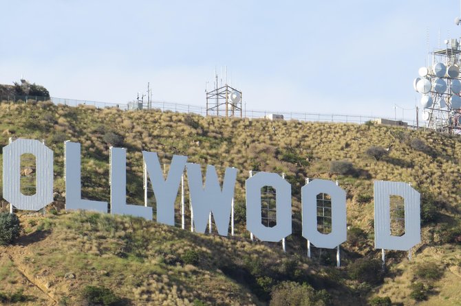 Private Tour of Los Angeles in a Luxury Vehicle - Muscle Beach Venice Gym and Venice Beach: Planet Earth to Hollywood in One Day