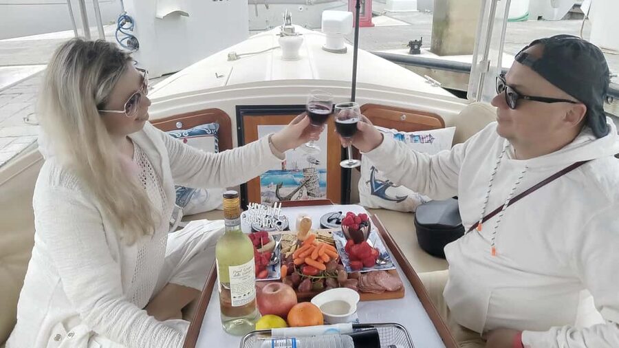 Romantic Boat Cruise with Wine & Cheese or Surprise Dinner - What You Get: Wine, Seasonal Snacks, Blankets, and Bluetooth