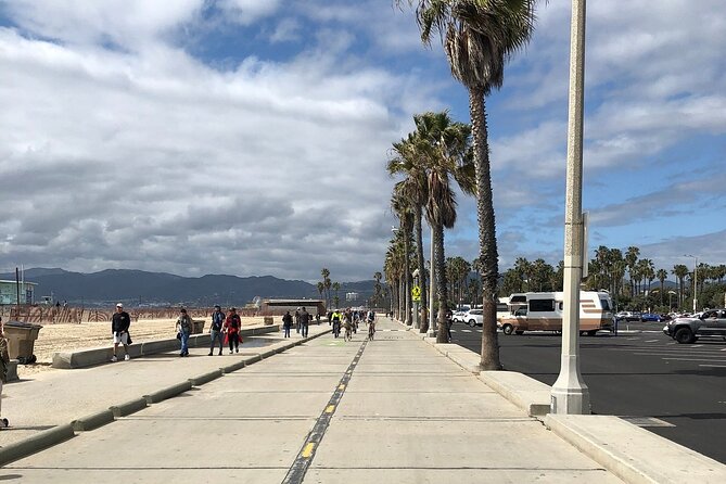 Santa Monica and Venice Beach Bike Adventure Tour - Boardwalk time, souvenirs, and watching live street performances