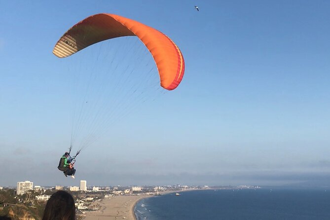 Tandem Paragliding flight with instructor in Malibu - The bluff takeoff: the moment you go from “standing” to “floating”