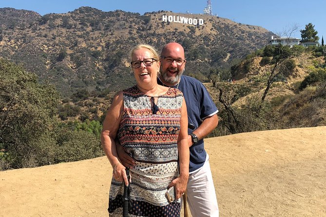 The Ultimate Hollywood Tour - Stop 5: Beverly Gardens Park, Beverly Hills Sign and lily pond photos